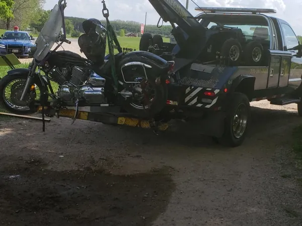 Precision Towing wrecker set up for a motorcycle tow