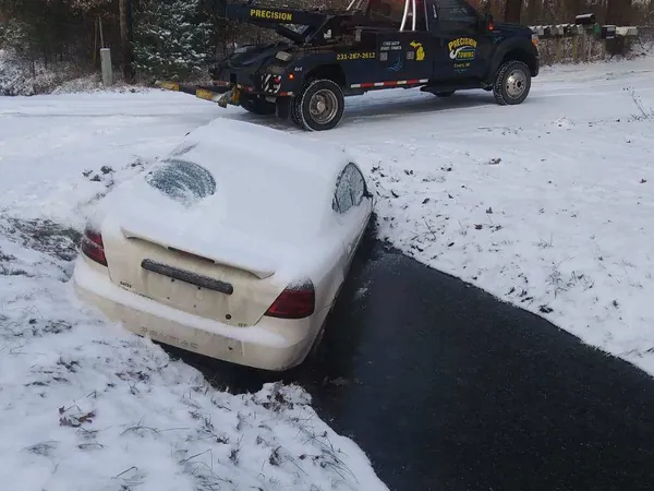 Car recovered from a snowy ditch