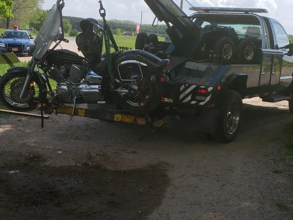 Precision Towing wrecker set up for a motorcycle tow